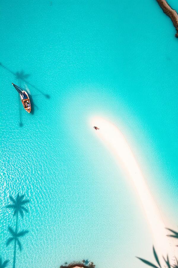 Turquoise Caribbean cove with white sand beach